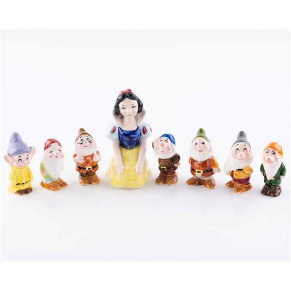 A "Snow White and the Seven Dwarfs" Ceramic Figure Set.