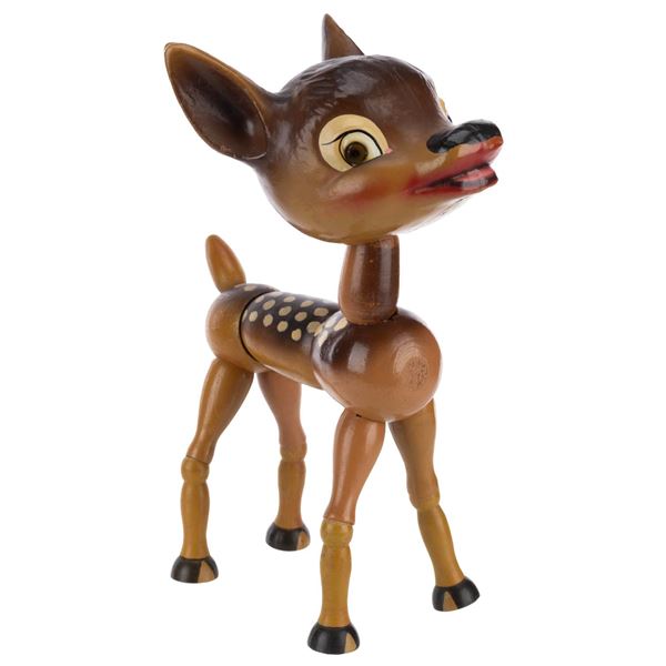A Wooden Jointed Bambi Toy.