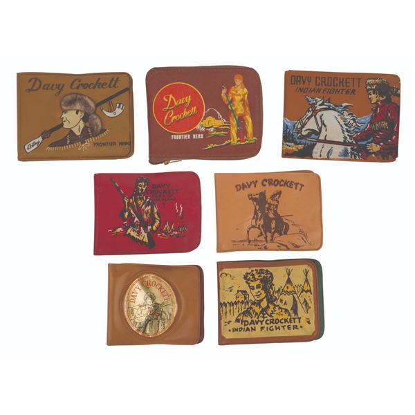 A Collection of 7 Davy Crockett Wallets.