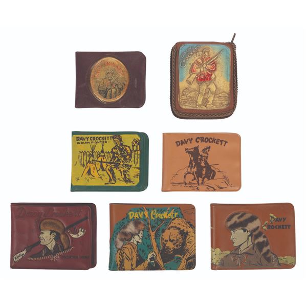 A Collection of 7 Davy Crockett Wallets.