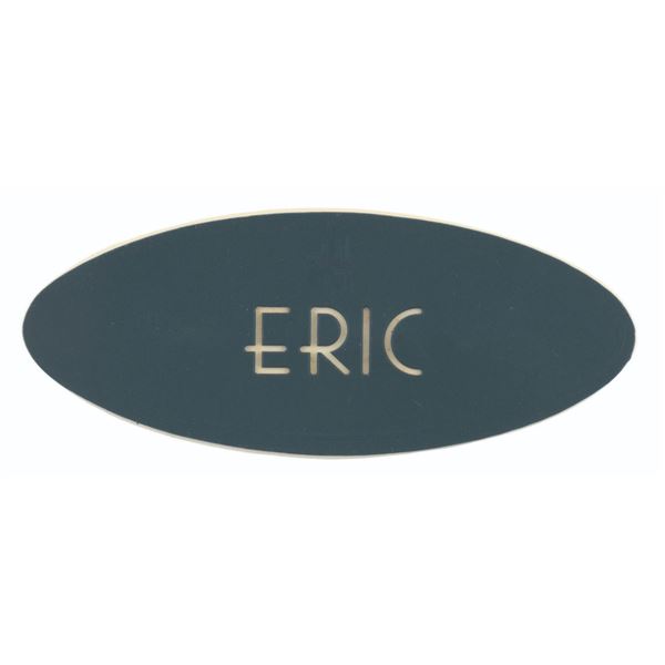 A 1960s "Eric" Blue Cast Member Name Badge.