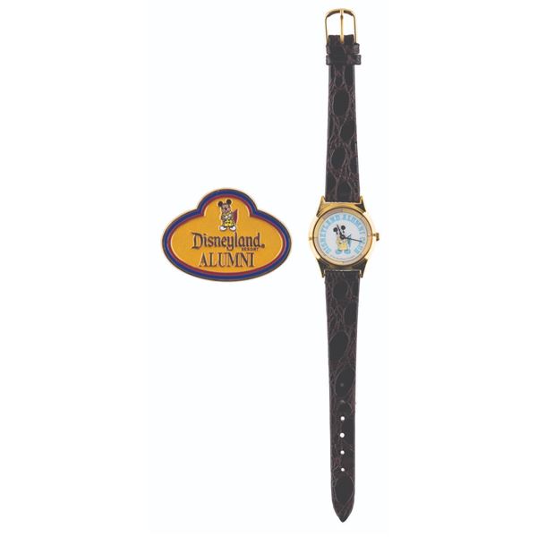 A Disneyland Alumni Club Watch and Pin.