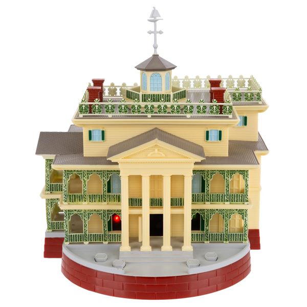 A Disneyland Haunted Mansion Light-Up Playset.