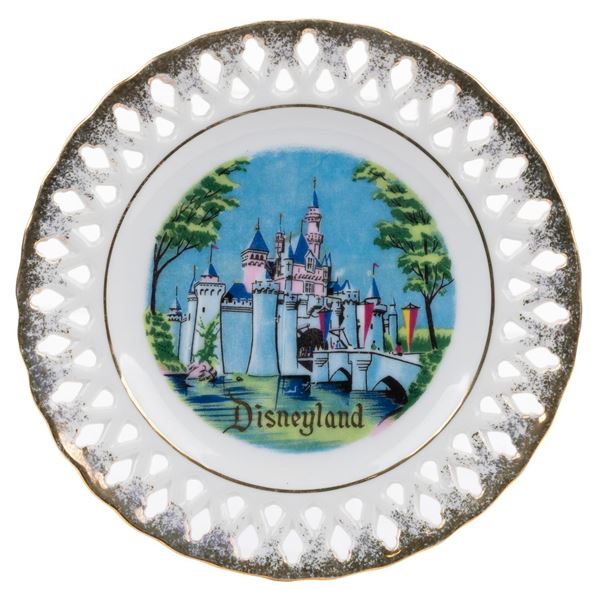 A Sleeping Beauty Castle Souvenir Lace Plate.