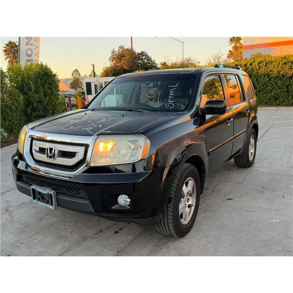 HOND PILOT 2011 O/S TITLE 2 DAYS