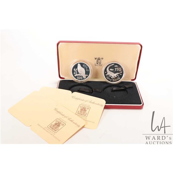 1976 Royal Mint two coin collector sets including "Government of Pakistan", 100 rupees and 150 rupee
