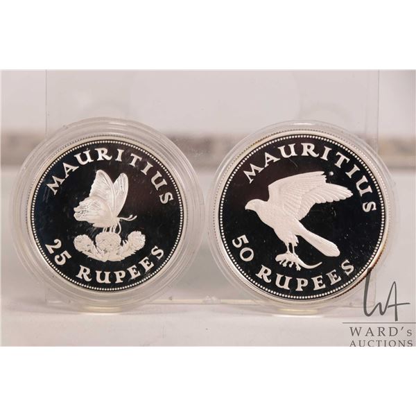 1975 Royal Mint two coin collector sets including "Maritius", 25 rupees and 50 rupees cins, each .92