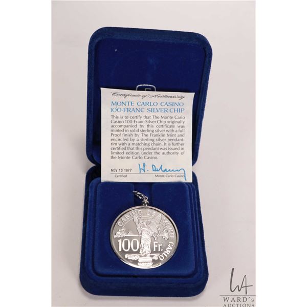 Franklin Mint mounted sterling silver Monte Carlo casino 100 franc chip with pendant bale, in presen