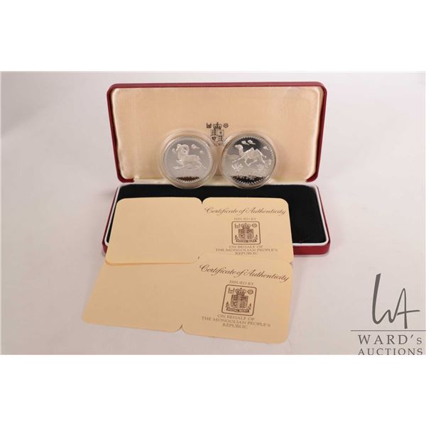 1976 Royal Mint two coin collector set including "Mongolian People Republic" a $25 tugrik and $50 tu
