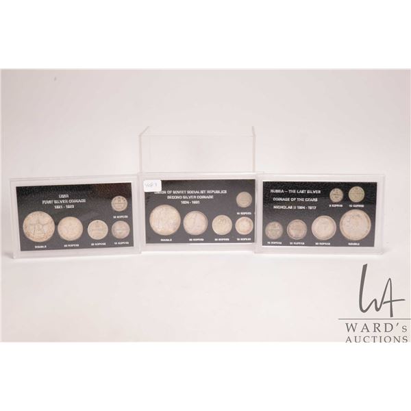 Three plastic cased USSR/ Russia coin sets including "First Silver Coinage 1921-1923", "Second Silve