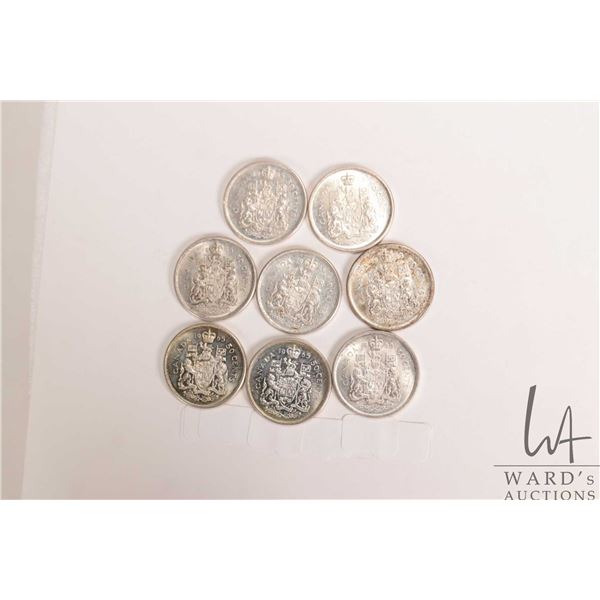 Eight Canadian 1965 fifty cent coins