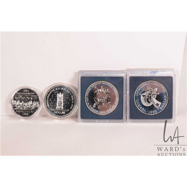 Four Canadian one dollar coins including 1988 Edmonton Universiade, 1988 Les Forges du St.-Maurice a