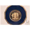 Image 3 : 1975 Franklin Mint "Jamaica" .900 proof 100 dollar gold coin with folder and certificate. (7.83 gram