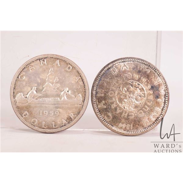 Two Canadian silver dollars including 1949 and 1964