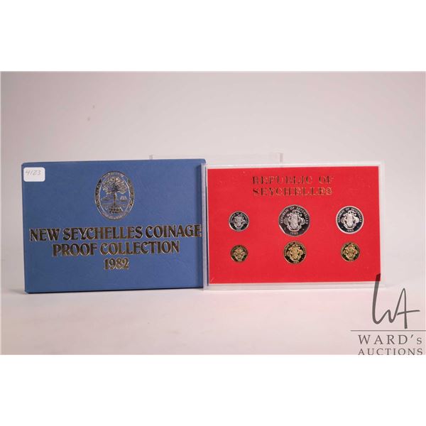 1982 Royal Mint "New Seychelles" proof coin set in acrylic holder with cardboard wrap