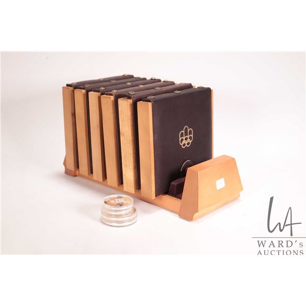 1976 Royal Canadian Mint Canadian Olympic sterling silver proof coins sets, each depicting various a