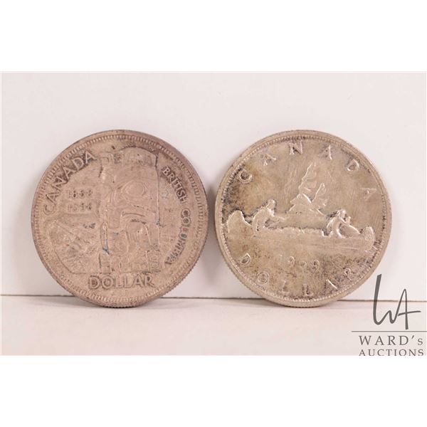 Two Canadian silver dollars including 1958 and 1959