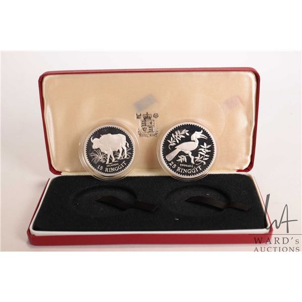 1976 Royal Mint "Malaysia" two .925 sterling silver collector coins including 15 riggit and 25 riggi