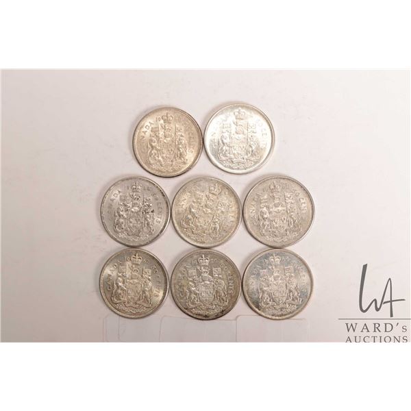 Eight Canadian fifty cent coins including 1959, 1960, 1962, 2 X 1963, 1964, 1965 and 1966