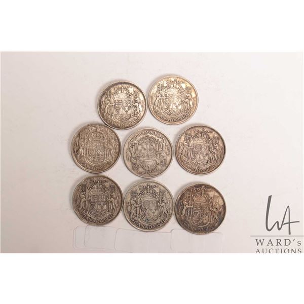 Eight Canadian fifty cent coins including 1940, 2 X 1941, 2 X 1943, 2 X 1944 and 1947