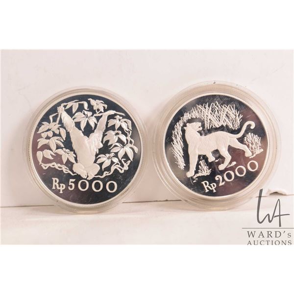 Two1974 "Indonesia" .925 sterling silver collector coins including 2000 and 5000 rupiah