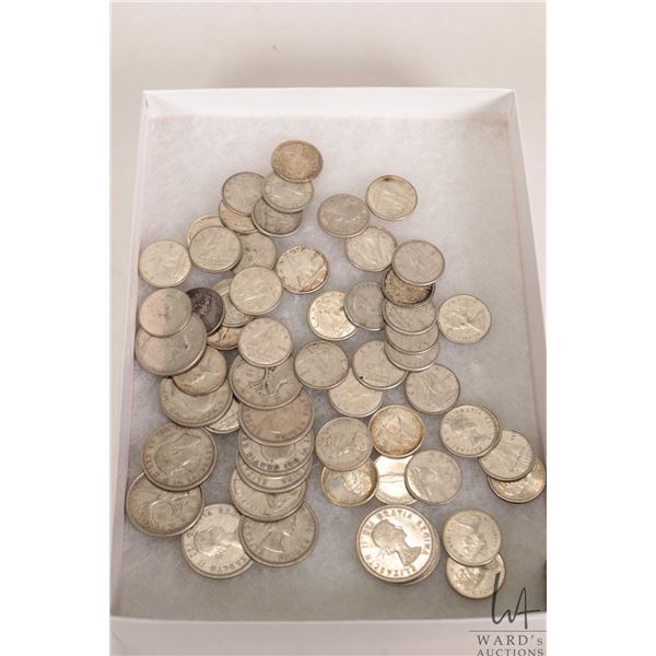 Thirteen Canadian silver quarters and forty six silver dimes