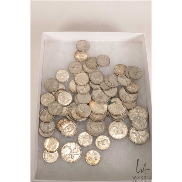 Fourteen Canadian silver quarters and forty six silver dimes