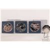 Image 1 : Three Canadian one dollar coins with 50% silver content including 1992 "Kingston to York Stagecoach"