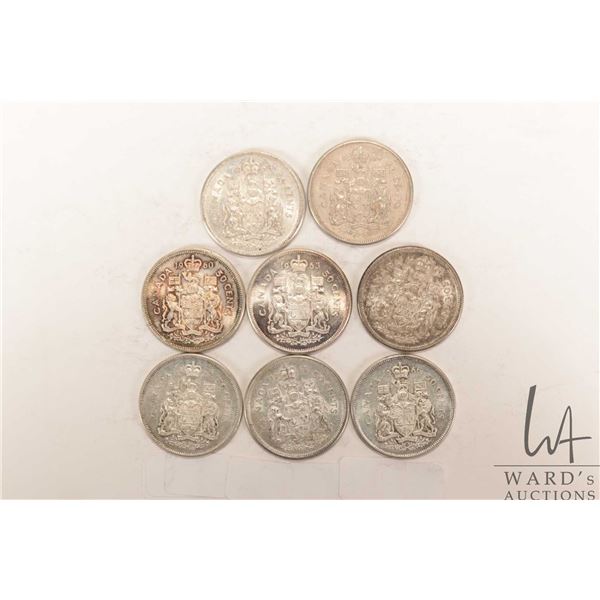 Eight Canadian fifty cent coins including 1960, 1961, 1962, 2 X 1963, 1964, 1965 and 1966