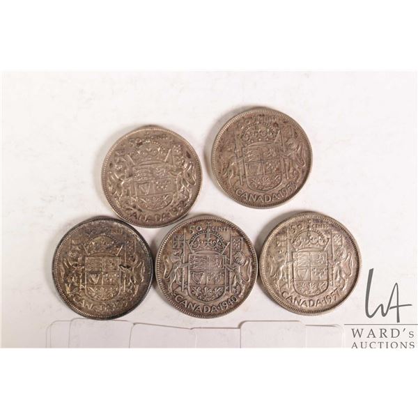 Five Canadian fifty cent coins including 1940, 1952, 1953, 1956 and 1957