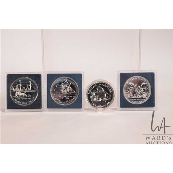 Four Canadian dollars with 50% silver content including 1979, 1987, 1989 and 1991