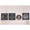 Image 1 : Four Canadian dollars with 50% silver content including 1977, 1981, 1986 and 1990