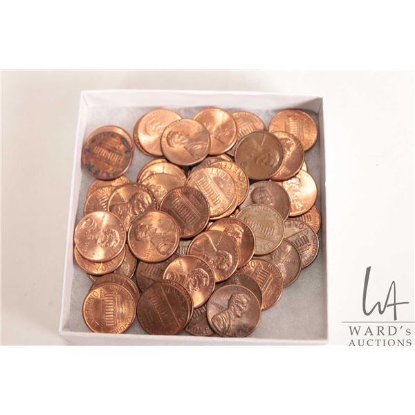 Fifty US pennies, various dates
