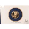 Image 2 : 1975 Franklin Mint "Cook Islands" .900 proof 100 dollar gold coin with folder and certificate. (9.6 