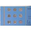 Image 3 : Two vintage Canadian quarter albums, containing 47 quarters in total