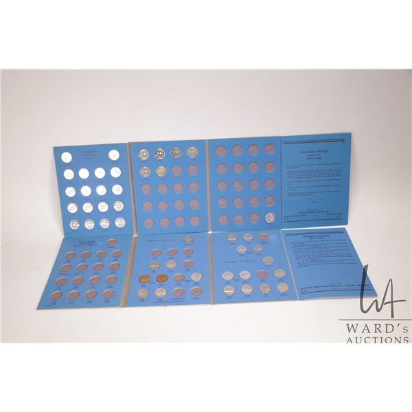 Two vintage Canadian collector nickel albums, containing 45 nickels in total