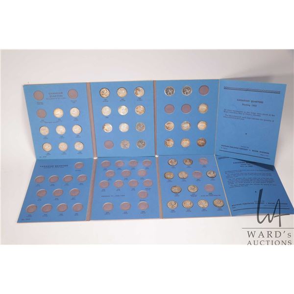 Two vintage Canadian collector quarter albums containing 39 quarters in total