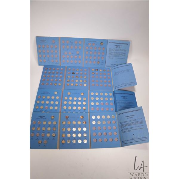 Four vintage Canadian dime collector coin albums containing approximately 115 dimes