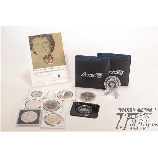Tray lot of collectible coins including two Alberta 75 collector coins, Official First Day Terry Fox