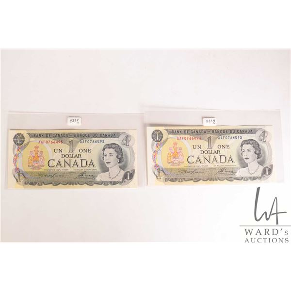 Two Canadian 1973 one dollar bills with serial numbers AAF0766493 and AFF0766495