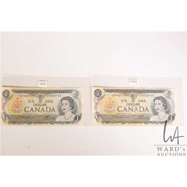 Two Canadian 1973 one dollar bills serial numbered OR3565705 and OR9433105