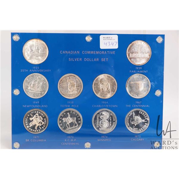 Encased "Canadian Commemorative Silver Dollar Set" containing ten Canadian one dollar coins from 193