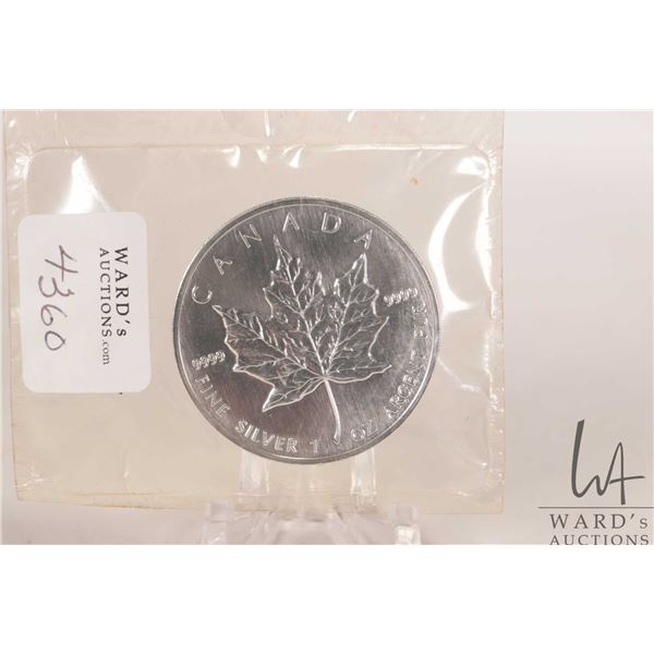Royal Canadian Mint 1999 five dollar .9999 fine silver Maple Leaf coin. (31.10 grams of .9999 silver