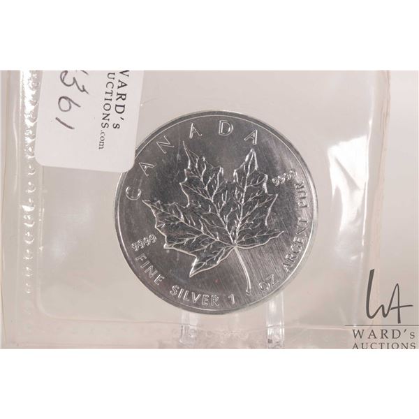 Royal Canadian Mint 1990 five dollar .9999 fine silver Maple Leaf coin. (31.10 grams of .9999 silver