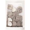 Image 1 : Twenty three Canadian one dollar coins from the 1980's and 1980's