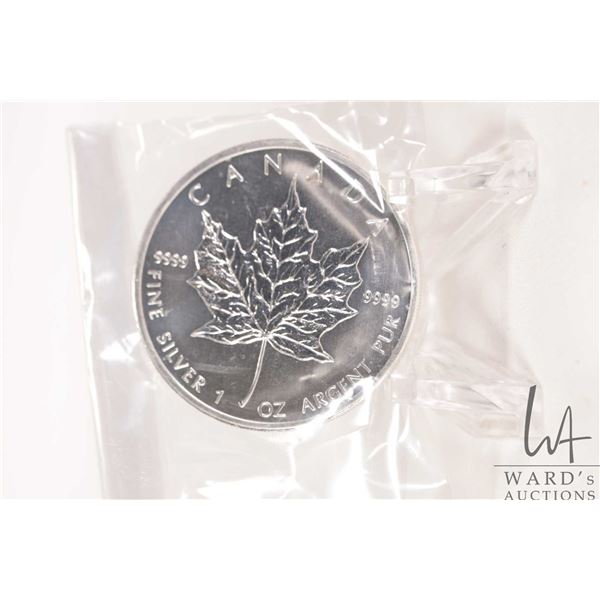 2012 Canadian five dollar .9999 fine silver maple leaf coin. (31.10 grams of .9999 silver)