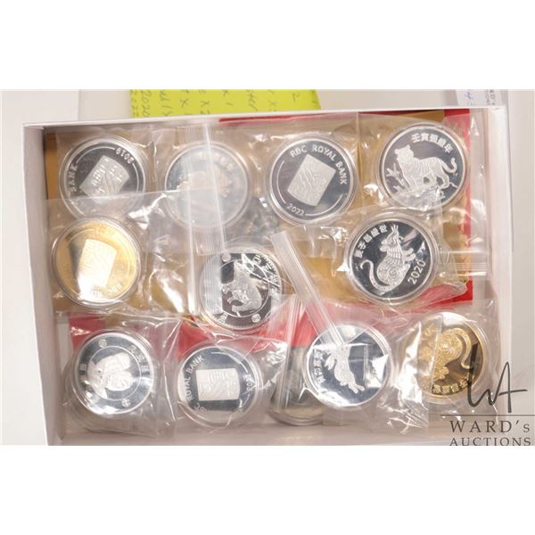 Fifteen RBC Chinese Zodiac Numismatic tokens including 2014 horse, 2017 Rooster X 2, 2018 Dog, 2019 