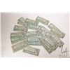 Image 1 : Thirty two 1954 Bank of Canada $1 bills in circulated to heavily circulated condition