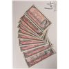 Image 1 : Thirteen 1954 Bank of Canada $2 bills in circulated to heavily circulated condition