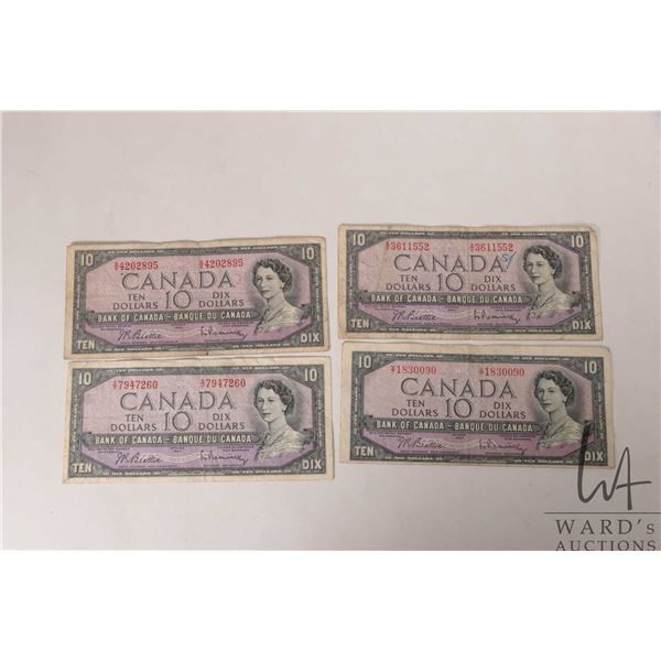 Four 1954 Bank of Canada $10 bills in circulated to heavily circulated condition